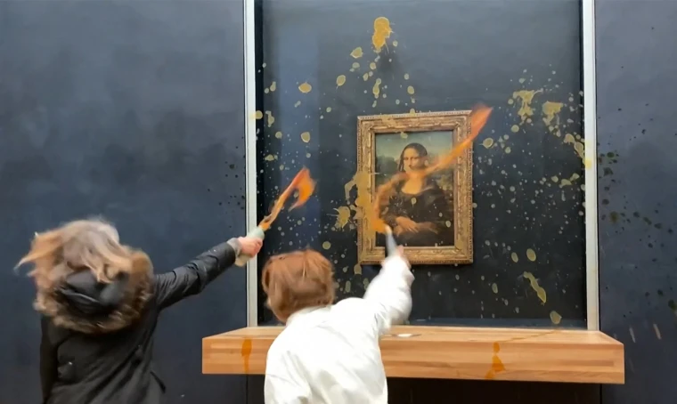 Climate Change Activists Splash Soup on Mona Lisa in Paris 